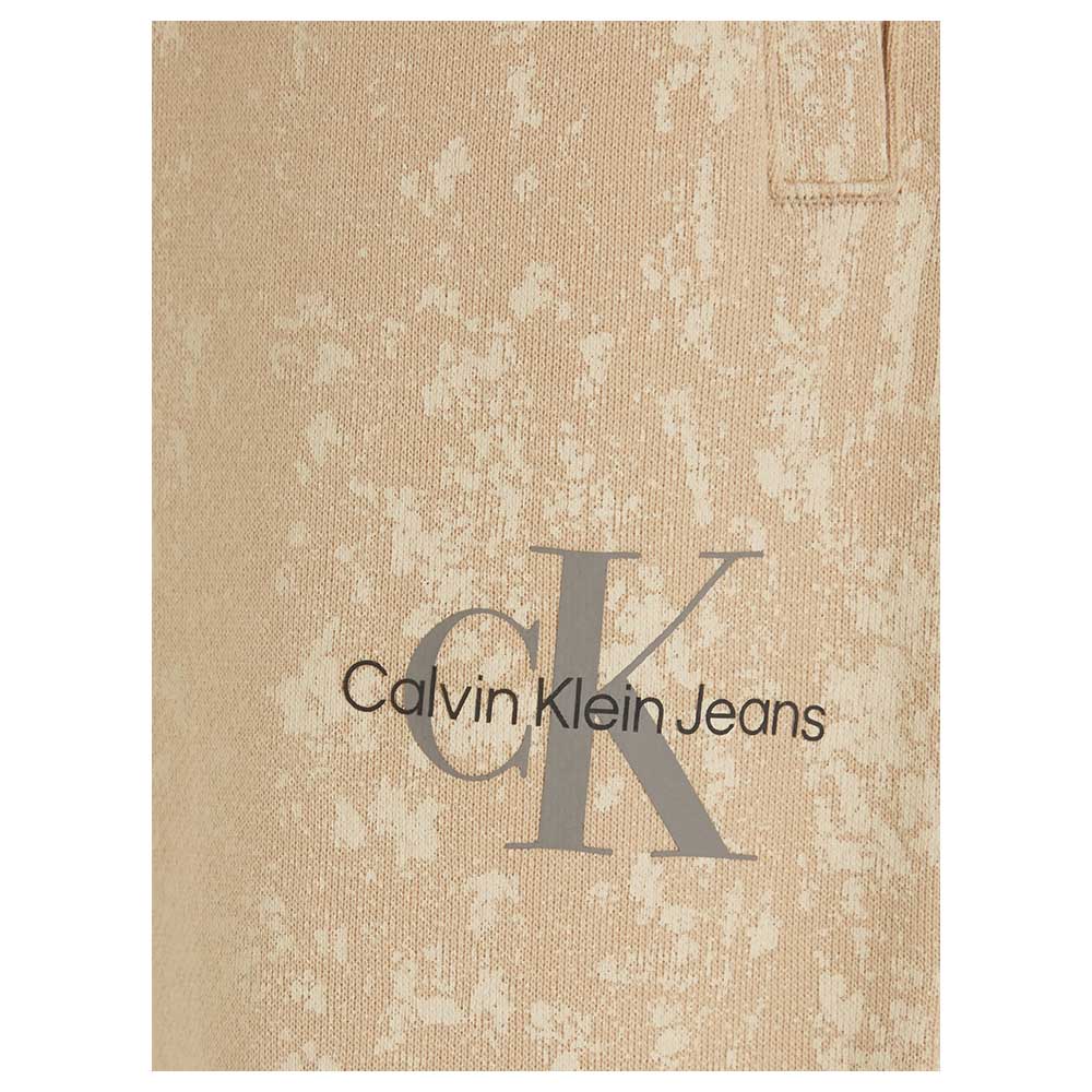 كالفن كلاين - بنطال رياضة بطبعة جلدية - بيج