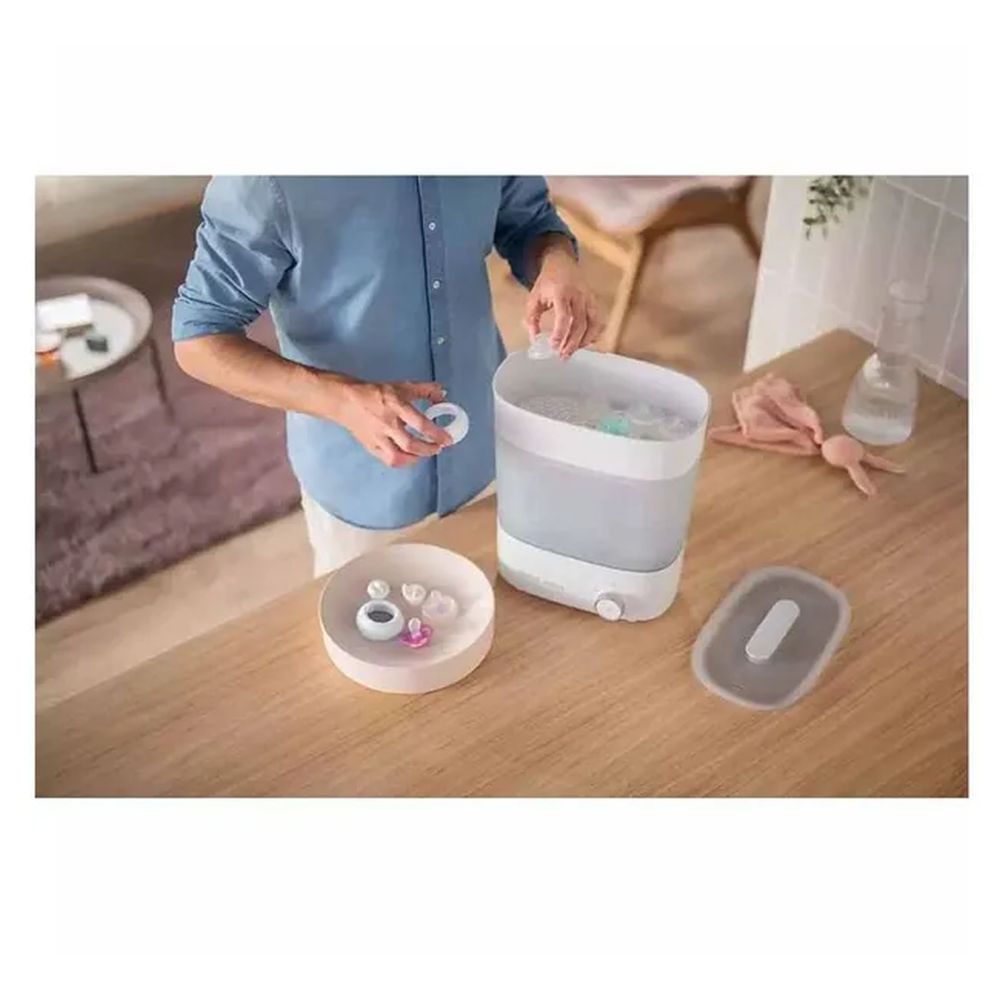 فيليبس أفينت - جهاز تعقيم بخاري فاخر مع مجفف ومجموعة رضّاعات رضاعة طبيعية للأطفال