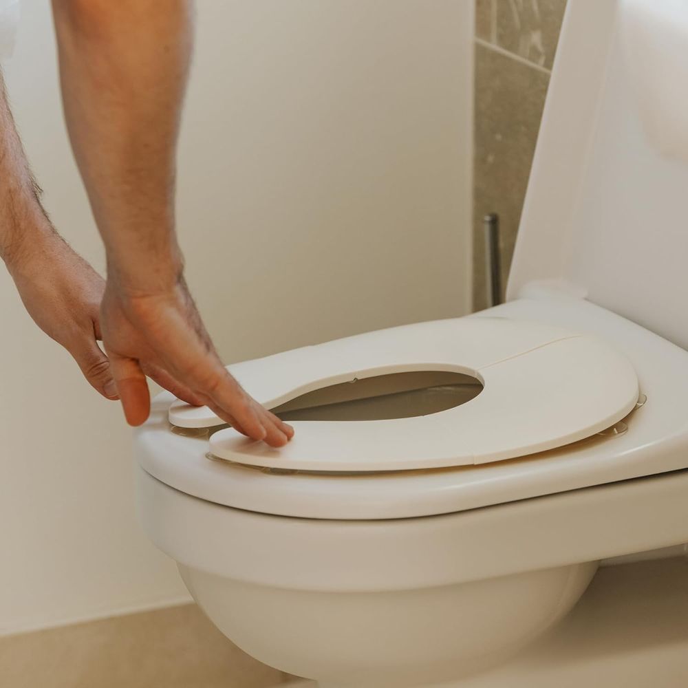 Nuby - Folding Potty Training Toilet Seat - White